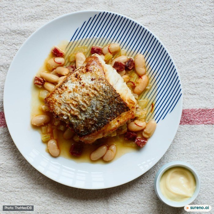 Pan-fried hake, white bean & chorizo broth, the finished dish