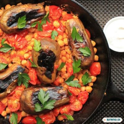 Stovetop Eggplant With Harissa, Chickpeas, and Cumin Yogurt